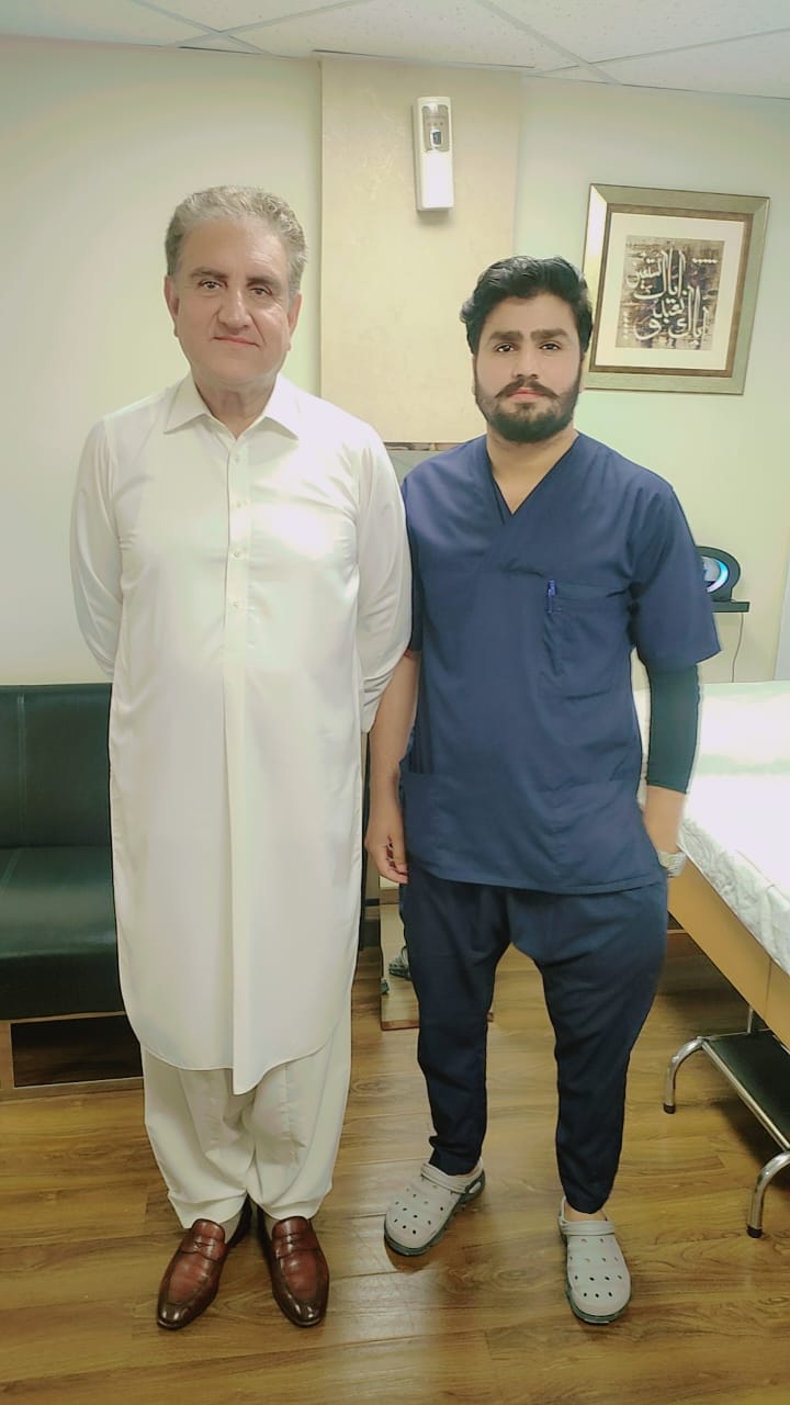 Makhdoom Shah Mahmood Hussain Qureshi with Dr. Dilawar